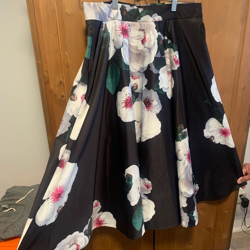 Black skirt with white floral pattern